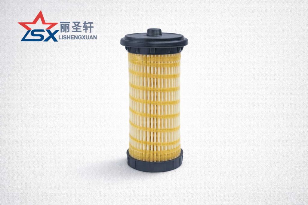 Fuel filter cartridge with plastic housing and pleated paper media for heavy-duty engines