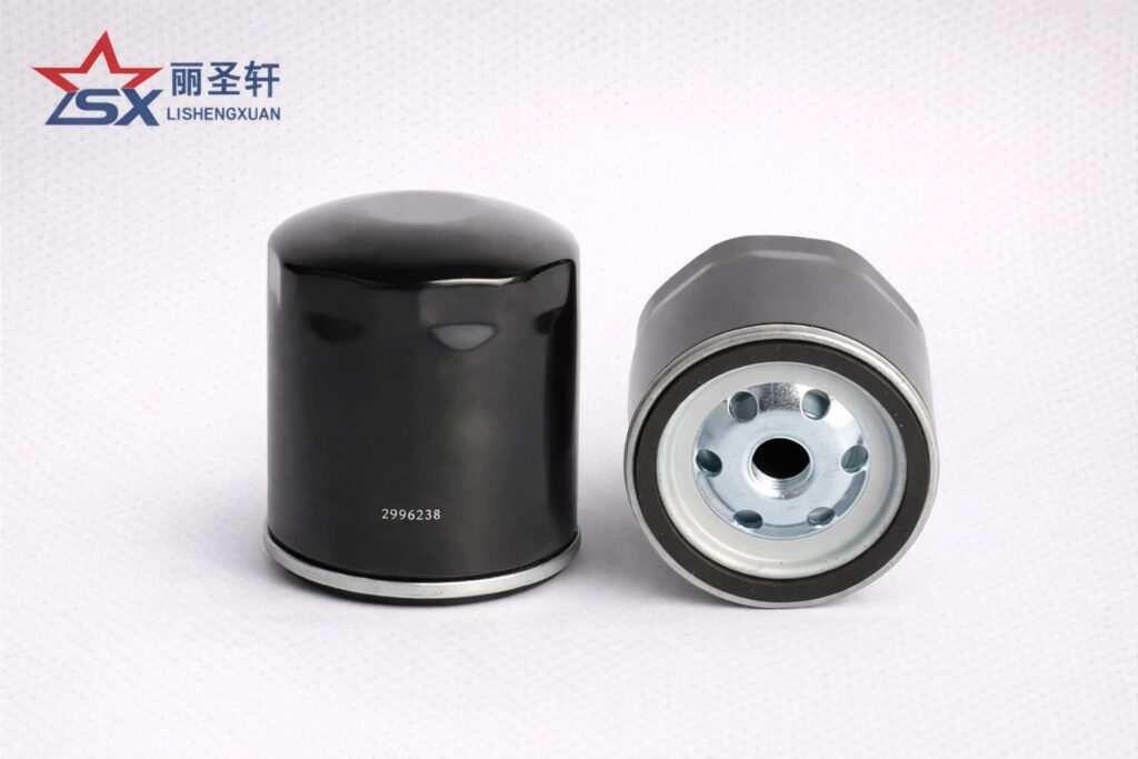 LSX branded spin-on oil filter with black steel housing and threaded base on a light gray catalog background
