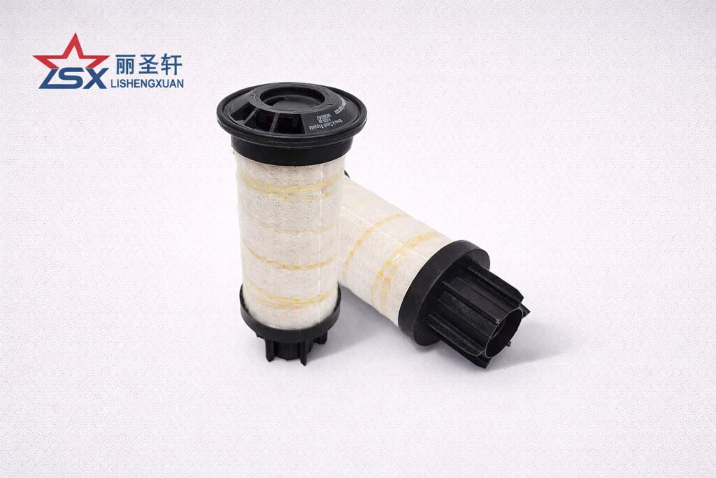 LSX fuel filter element catalog image, two fuel filter elements on light gray textured background
