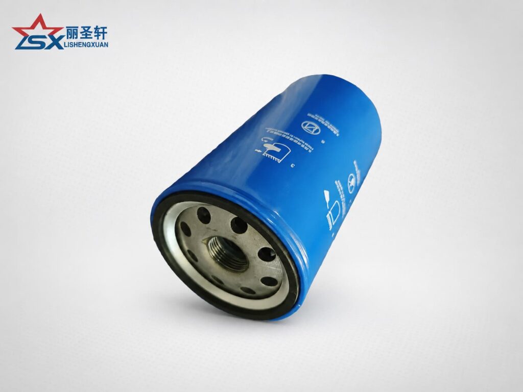 Blue spin-on oil filter with threaded mounting base for industrial engine lubrication system